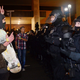 A protester gestures at police at Pioneer Square in Portland, Ore., on Nov. 11, 2016. (Ankur Dholakia/Getty Images)